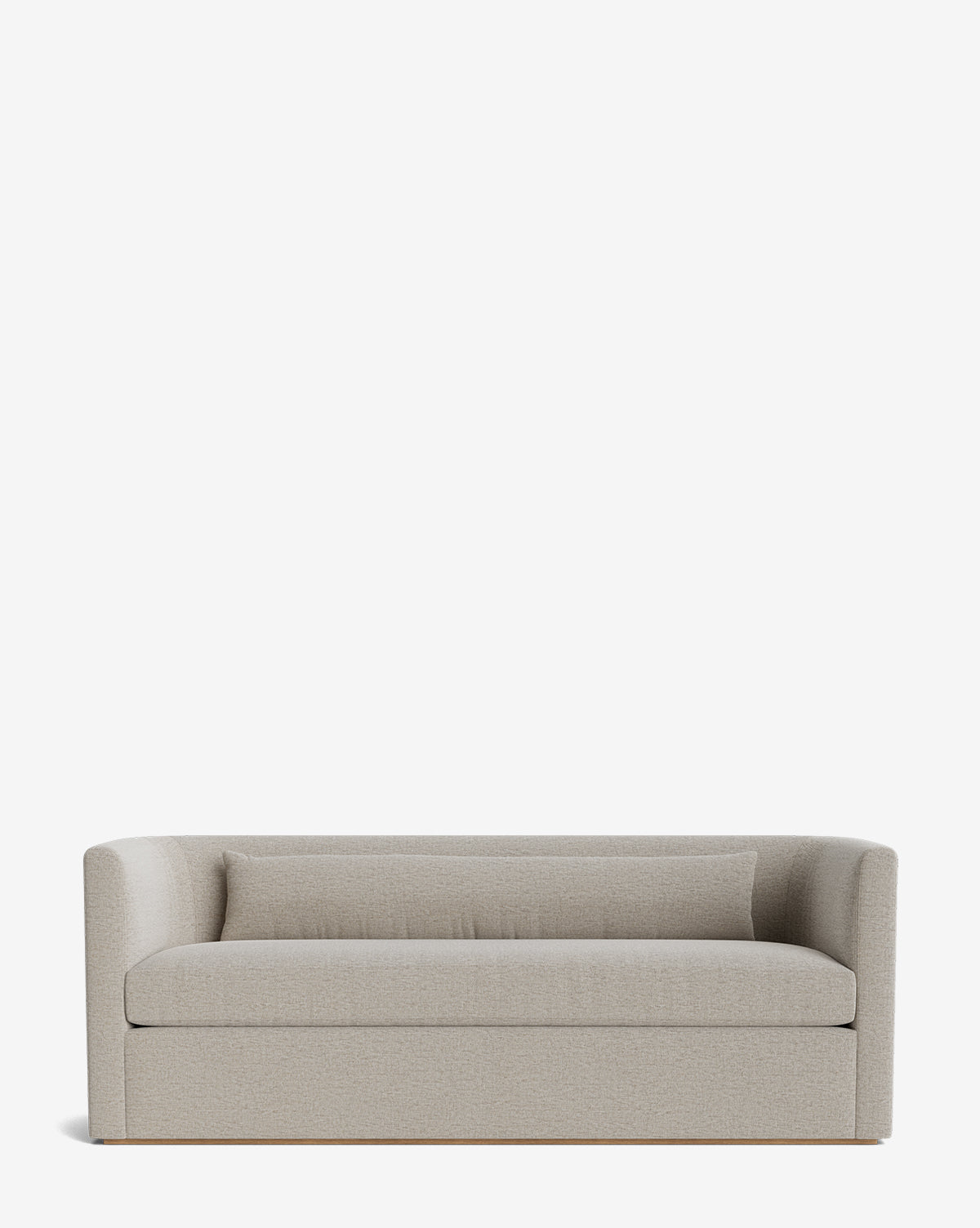 The Reese Sofa (84-96) offers modern light gray upholstery, a low backrest, curved armrests, a matching lumbar pillow, down-wrapped cushions, and handcrafted alder wood for comfort and durability against a plain white background by McGee & Co.