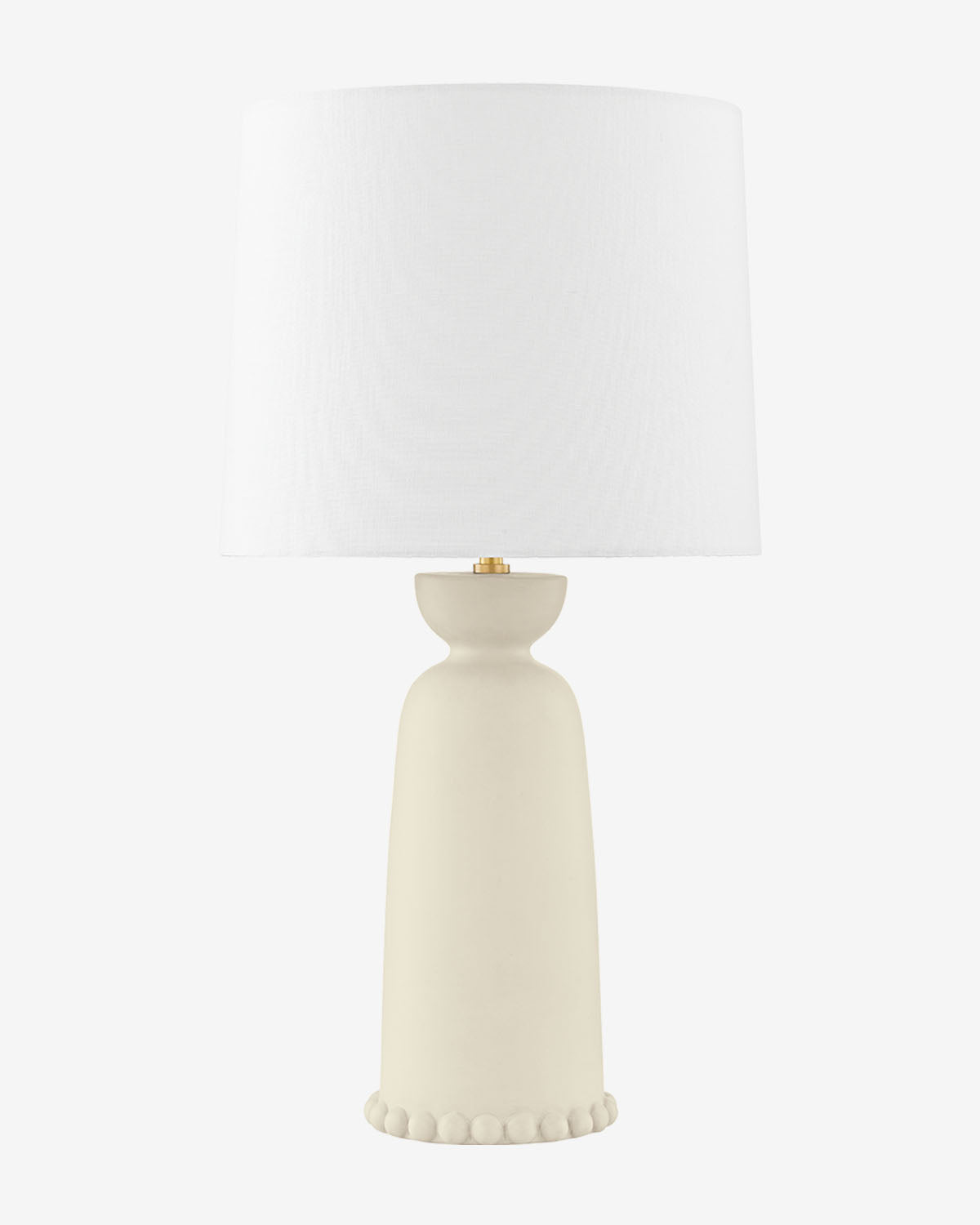 The Rhea Table Lamp features a matte cream ceramic base with small round accents and a large ivory shade, adding contemporary style to any room, by McGee & Co.