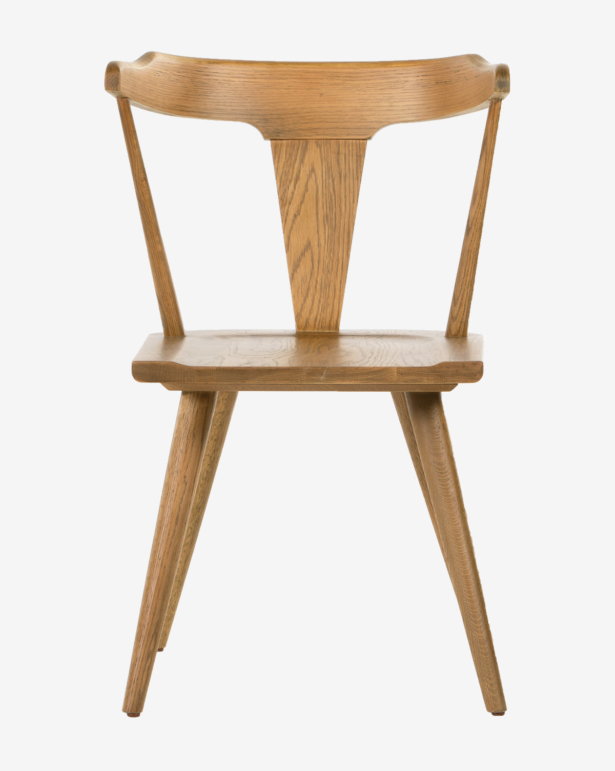 The Ruthie Dining Chair showcases minimalist mid-century modern design with angled legs, a flat seat, and a wide curved backrest—all crafted from light-colored wood for timeless style.