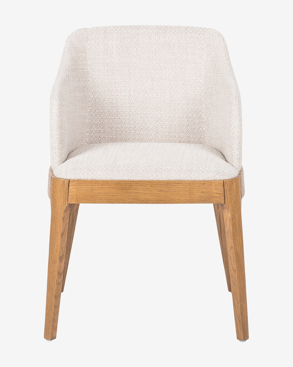 The Ryne Dining Chair boasts a light beige upholstered seat and backrest paired with four angled solid oak legs, offering a sleek, minimalist design by McGee & Co.