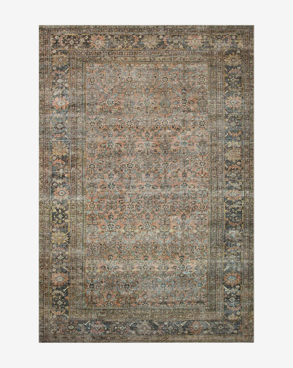 The Santa Maria Rug is a rectangular area rug inspired by vintage textiles, showcasing intricate floral and geometric patterns in muted blue, beige, and rust tones with a decorative border framing the central design by McGee & Co.