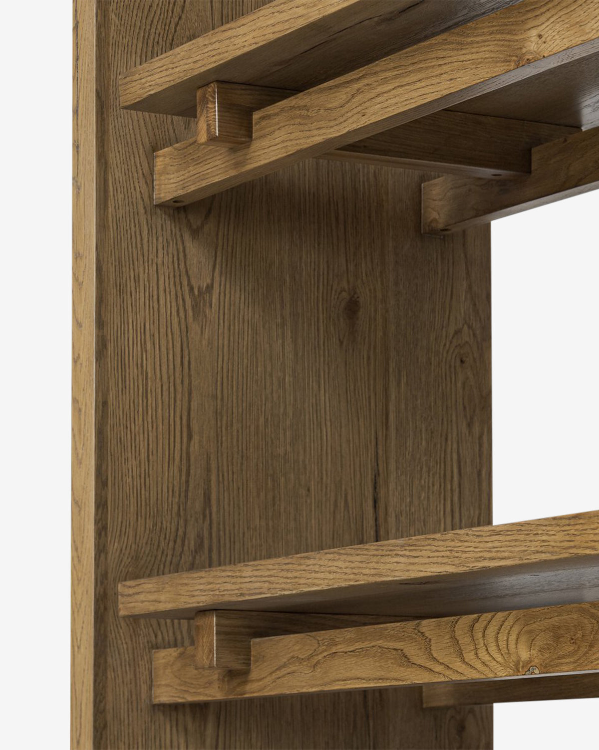 Close-up of the Selene Bookcase, showcasing its horizontal wooden shelves, sturdy brackets, and vertical panel with a natural wood grain finish that highlights its modern, organic design, by McGee & Co.