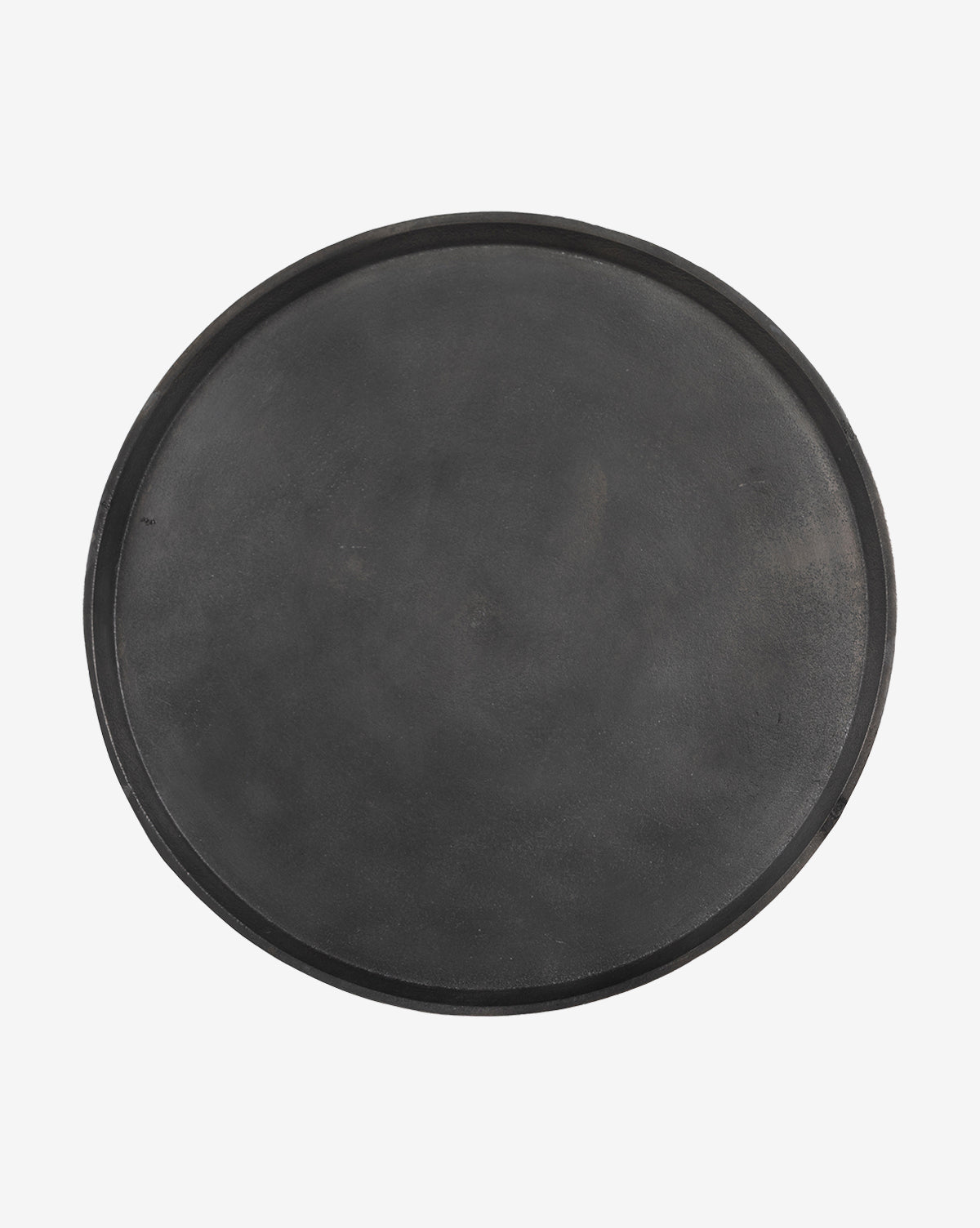 A round, black serving tray with a flat surface and raised edge, inspired by the elegant Sheba Side Table from Four Hands, shown against a plain white background, McGee & Co.