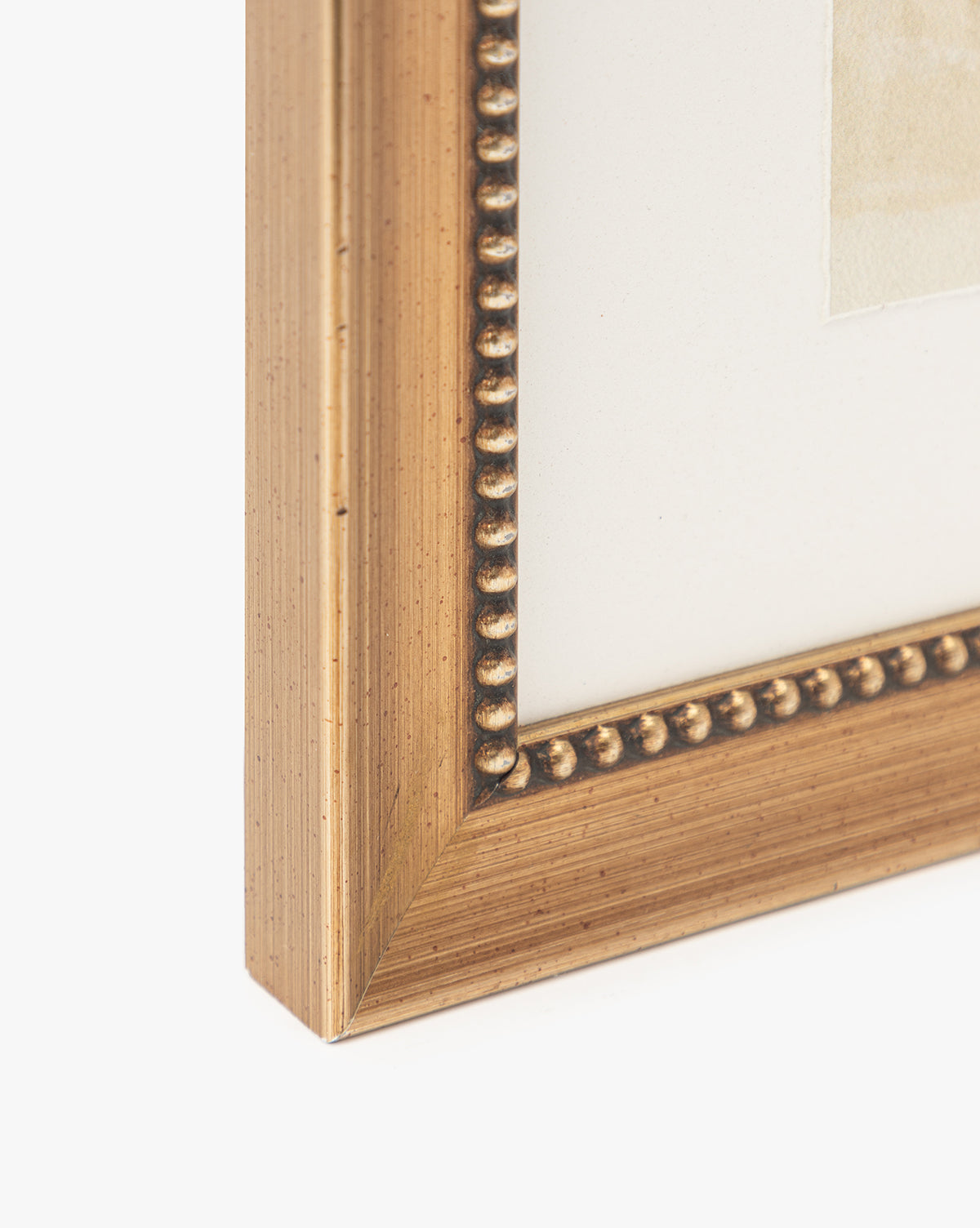 Close-up of the corner of an antique silver wood frame with a beaded edge and white mat, featuring Sky Studies 5—an ideal way to display this calming artwork or favorite giclee print.