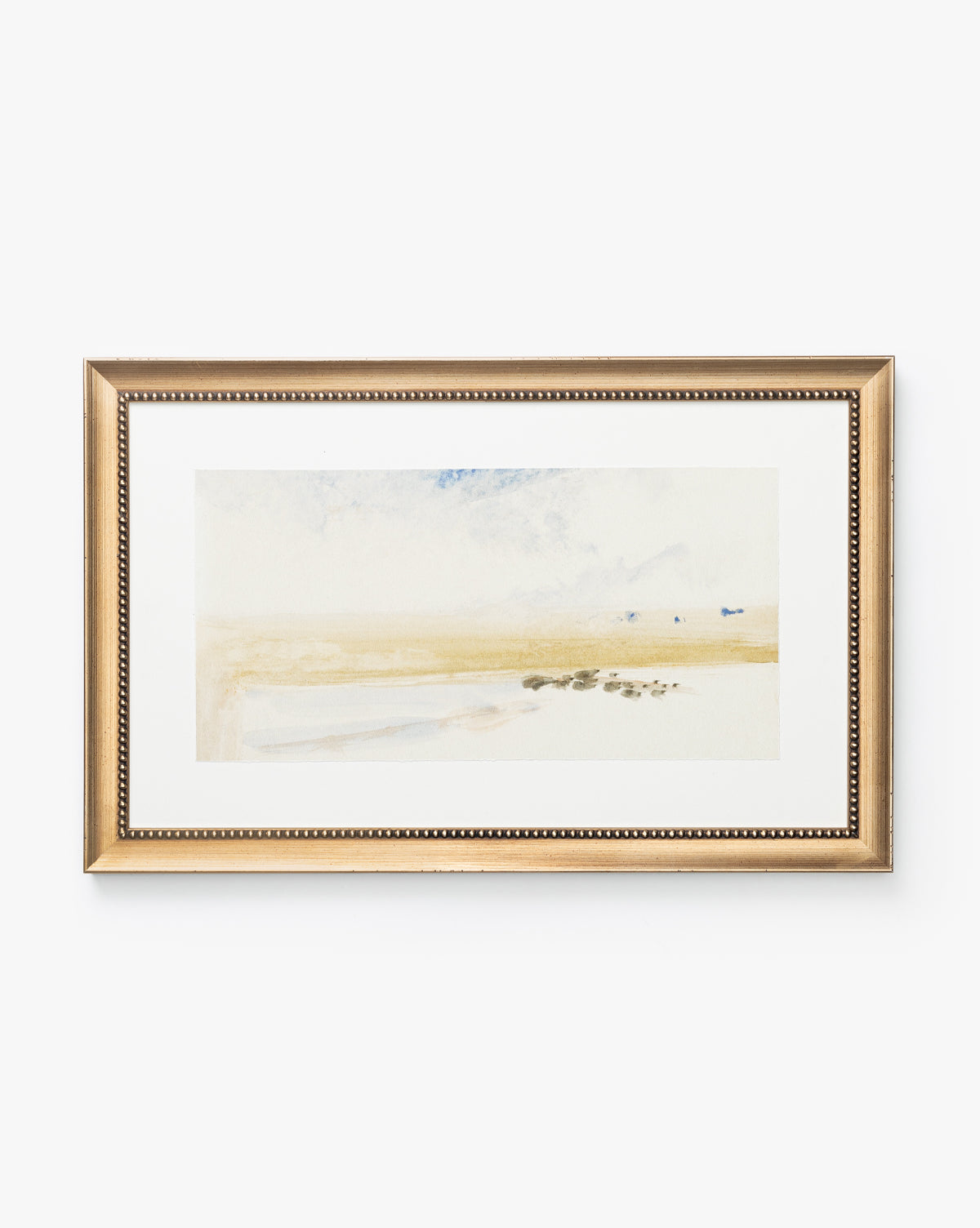 “Sky Studies 6” is a calming minimalist landscape painting in soft beige, blue, and white tones, presented in a gold beaded frame and set against a white background.