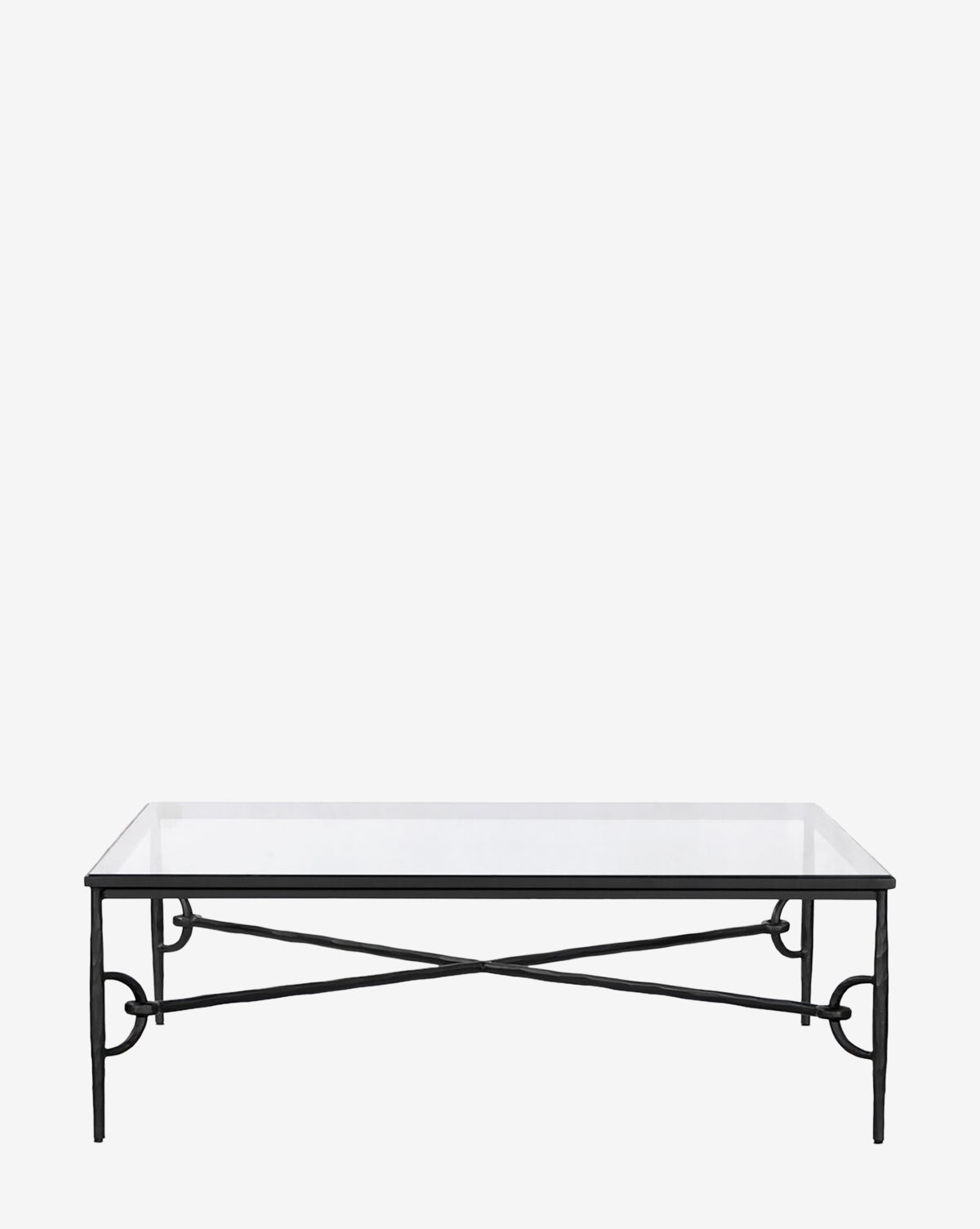 The Skye Coffee Table features a rectangular tempered glass top and a black metal frame with crisscross and circular accents on the legs, shown against a plain white background by McGee & Co.