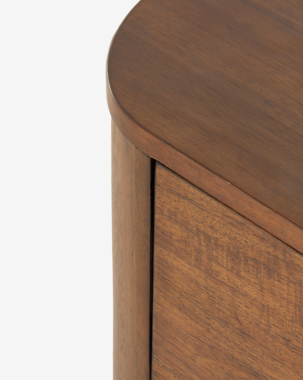 Close-up of the Steffon Nightstand’s rounded top corner, showcasing its smooth finish and natural acacia wood grain—ideal for refined bedroom style against a plain white background, by McGee & Co.