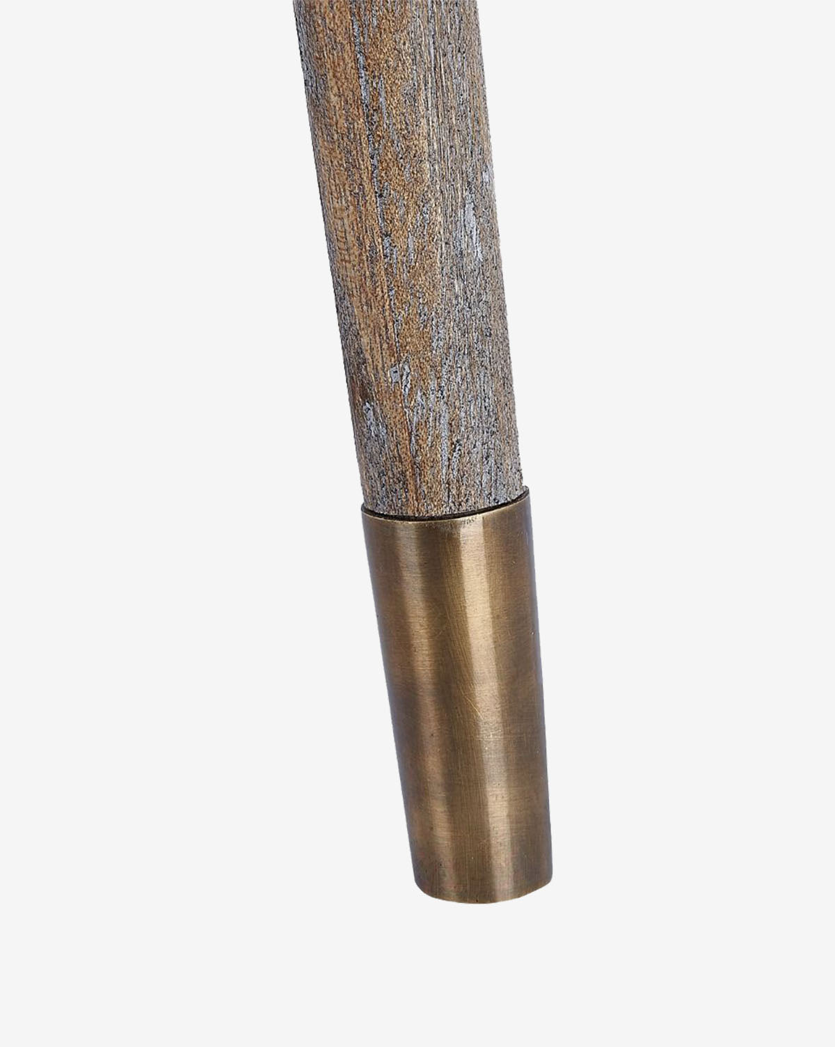 A close-up of the Tallulah Stool by Villa & House, LLC shows its mahogany leg with a tapered brass or bronze cap, set against a plain white background—McGee & Co.