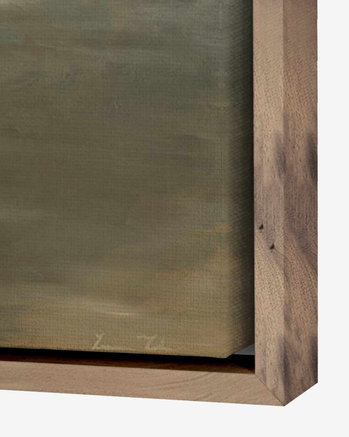 Close-up of a warm wood frame with natural finish and visible grain, holding Terrain by Lauren Fuhr—a matte canvas with a muted, greenish-brown abstract landscape, by McGee & Co.