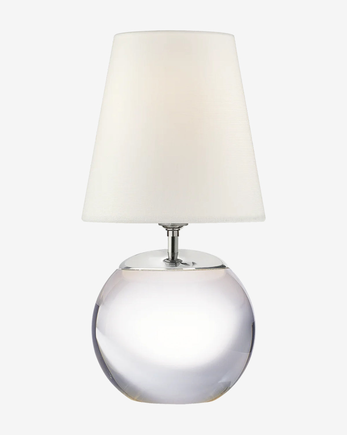 The Terri Round Table Lamp features a round, clear glass base and a white, slightly tapered fabric shade, shown against a plain light background by McGee & Co.