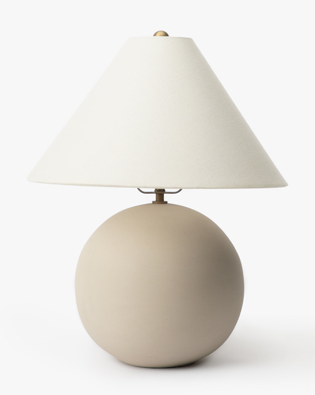 The Tess Ceramic Table Lamp features a round beige ceramic base and a wide, cone-shaped white lampshade, displayed against a plain white background by McGee & Co.