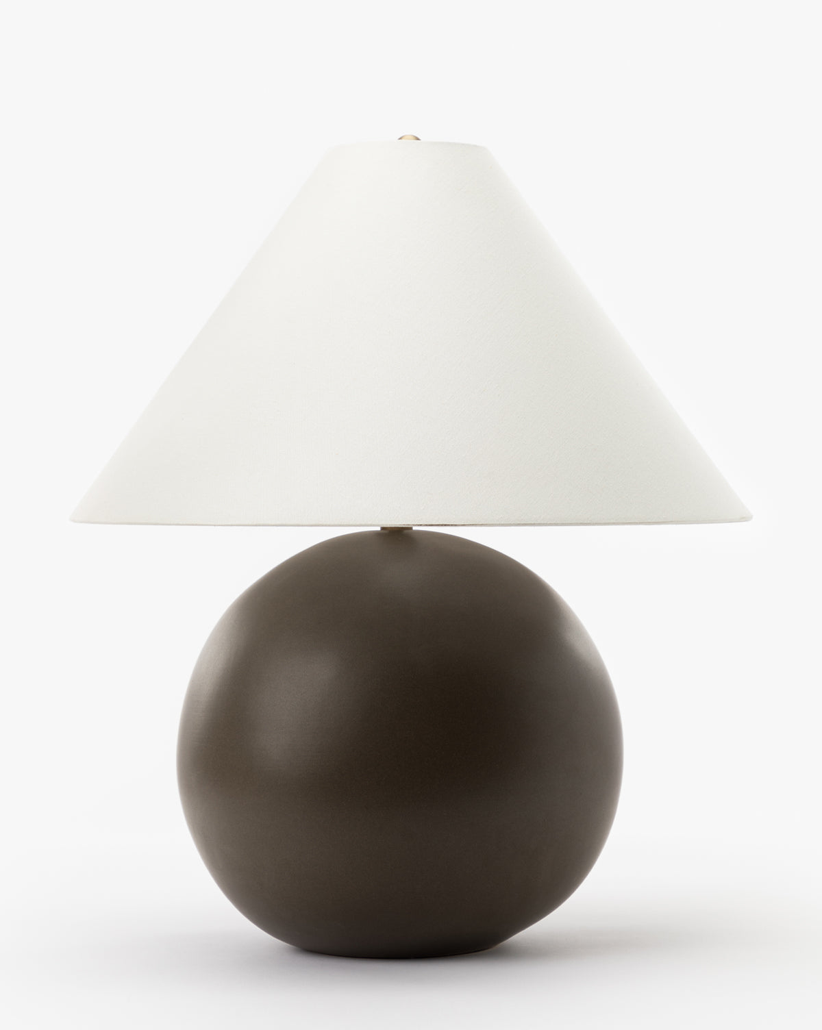 The Tess Large Ceramic Table Lamp features a modern, smooth, round dark brown ceramic base with a large white cone-shaped lampshade, displayed against a plain white background by McGee & Co.