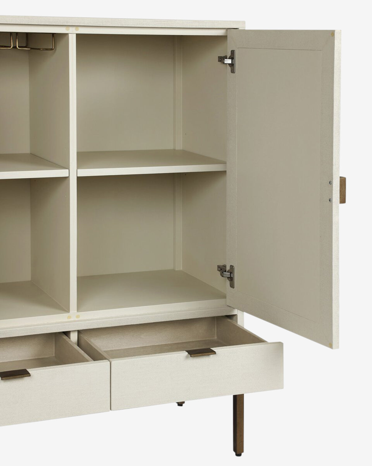 The Thaddeus Cabinet features a modern classic design with open shelves, a right-opening door, and two partially open bottom drawers, providing extra storage space on four slender legs, by McGee & Co.