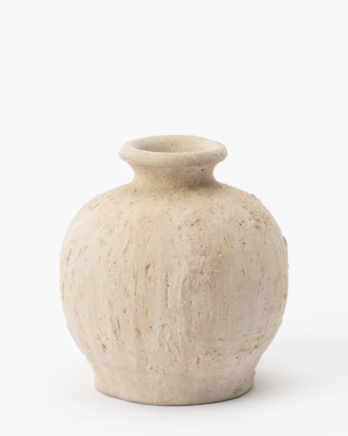 The Thalia Bud Vases (Set of 3) feature round, off-white textured ceramic bodies with wide bases, narrow necks, and flared rims—handmade to evoke the timeless charm of traditional terracotta vases against a plain white background.