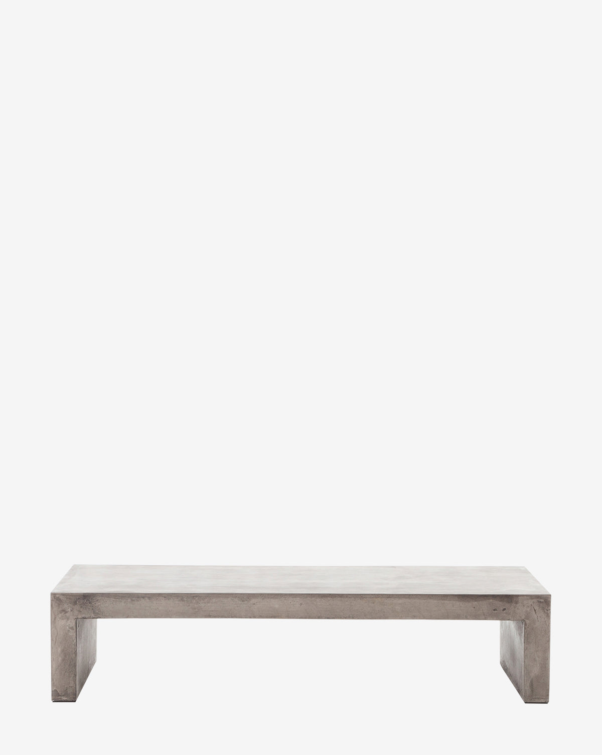 The Thaxton Outdoor Coffee Table features a minimalist, rectangular concrete design with block-style legs and a smooth surface, offering a modern, industrial look. Displayed against a plain white background to highlight its style by McGee & Co.