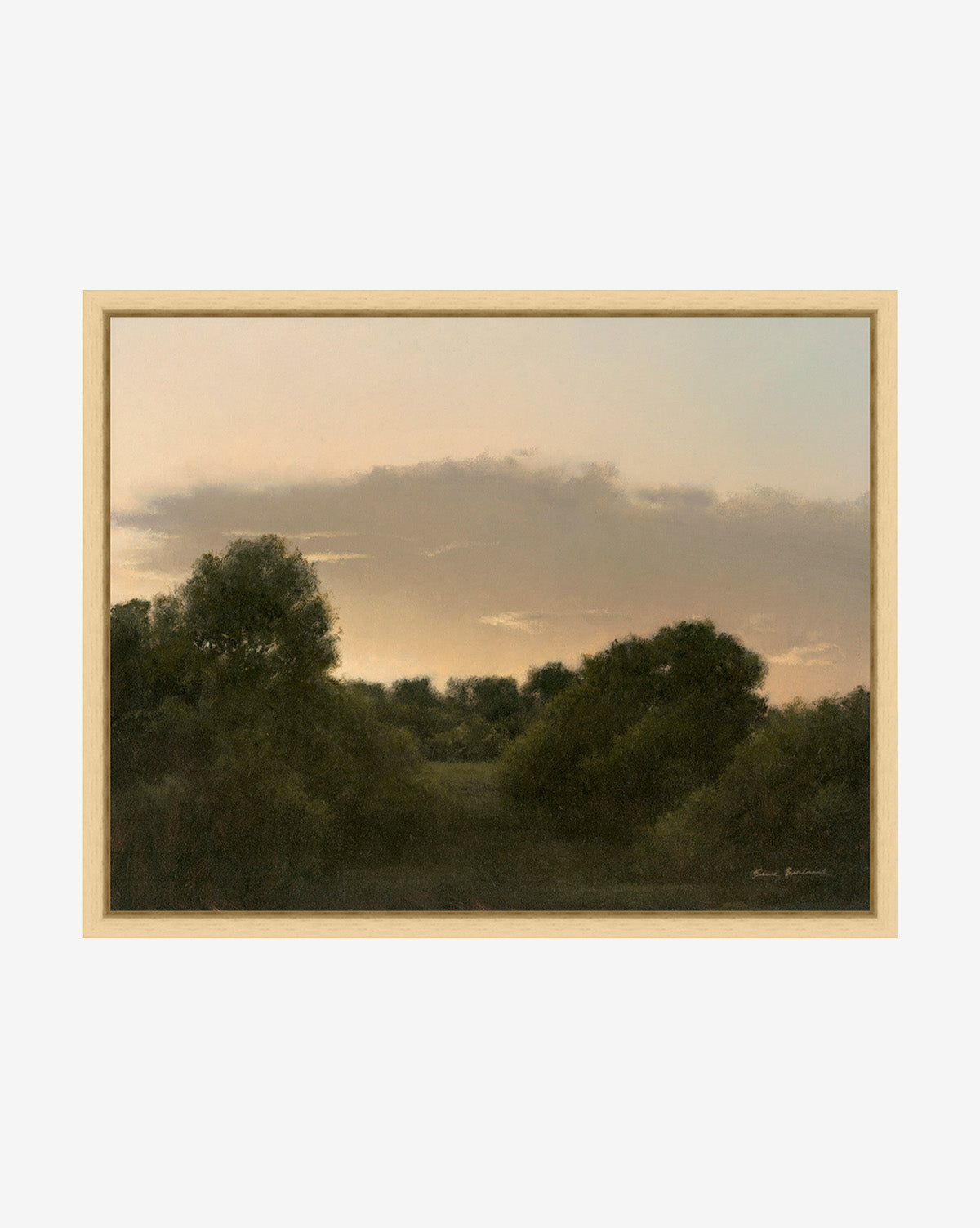 Framed wall art titled The Grove by Bruce Brainard depicts a tranquil landscape at dusk, with dense green trees and foliage beneath a pastel sky softly lit by fading sunlight and clouds.