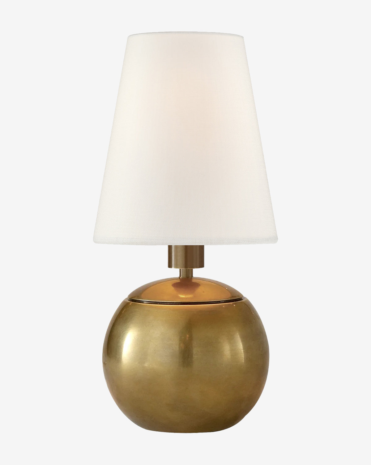 The Tiny Terri Accent Lamp features a round gold metallic base and a white, conical natural paper shade, shown against a plain white background. This stylish accent lamp adds elegance to any space by McGee & Co.