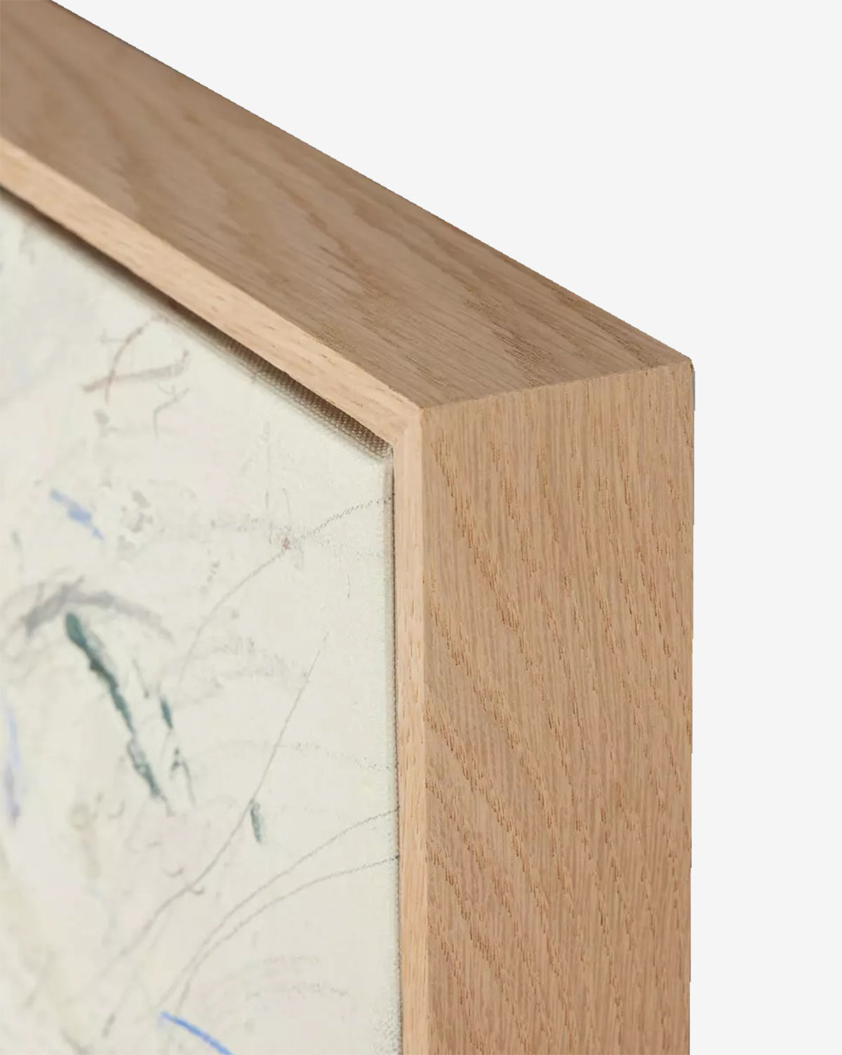 Close-up view of the top corner of a light wood picture frame holding To Show the Way by Tyler Guinn, featuring expressive brush strokes from the abstract art piece, by McGee & Co.