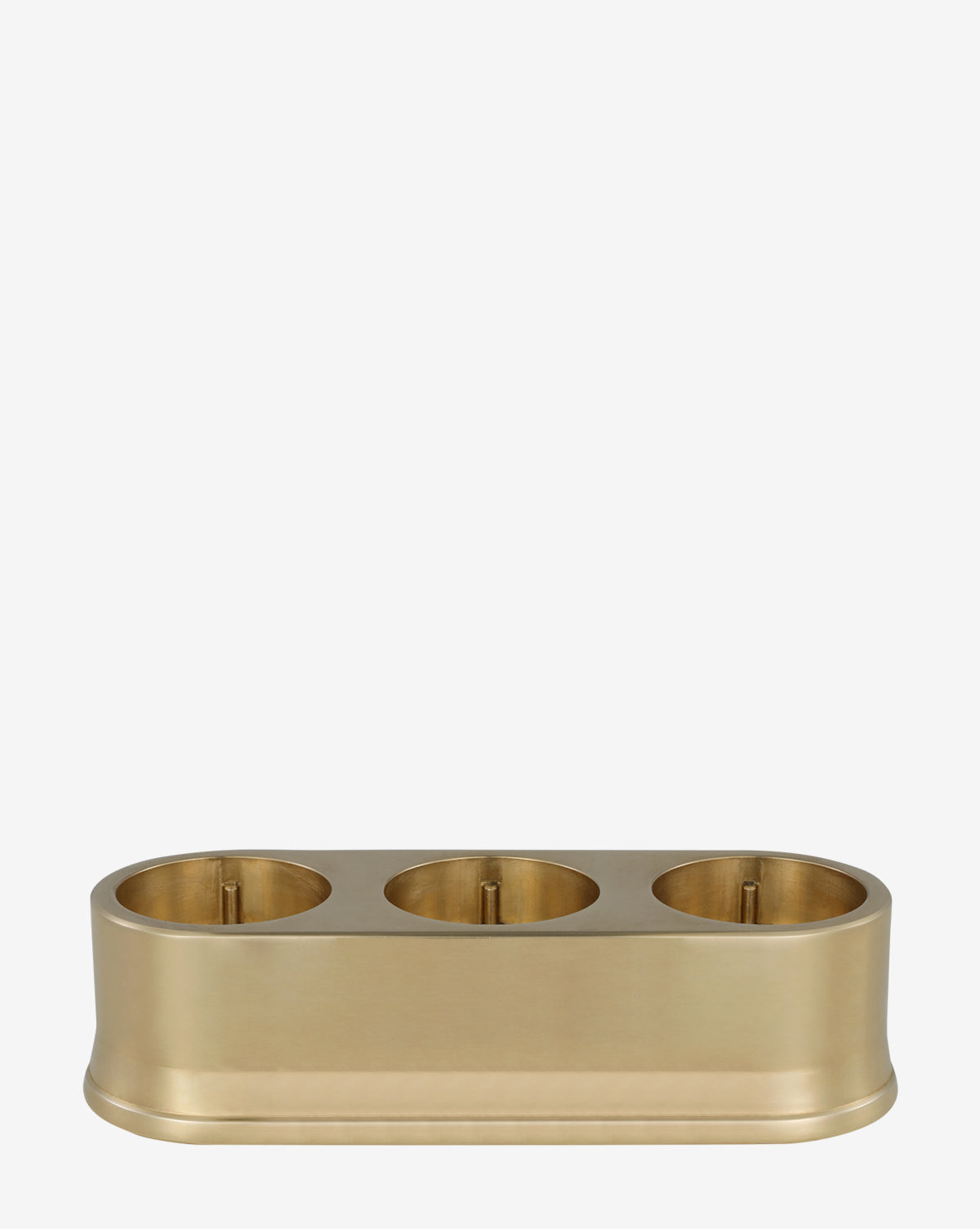 The Triple R45 Universal Charging Station is a rectangular gold metal organizer with three circular compartments, ideal for holding and charging devices, displayed against a plain white background, by McGee & Co.