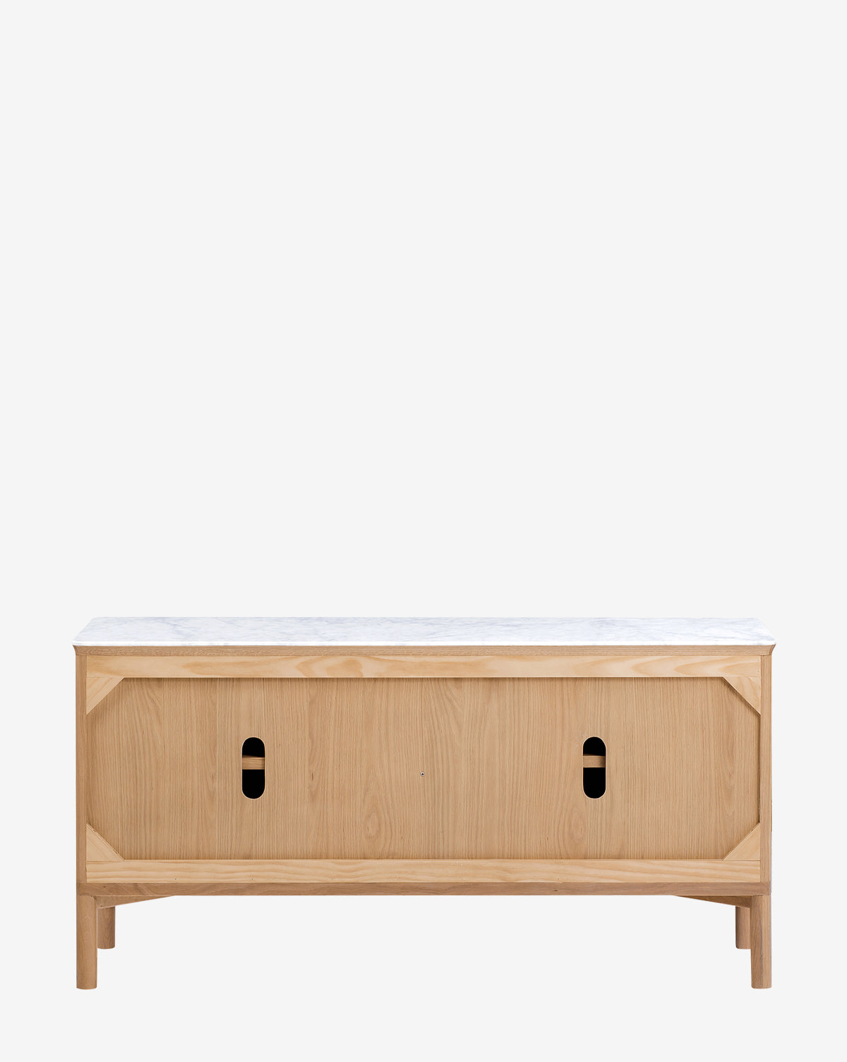 The Vale Sideboard features a light oak finish and a white marble top, with two sliding doors that have oval cutout handles, all showcased against a plain white background, by McGee & Co.