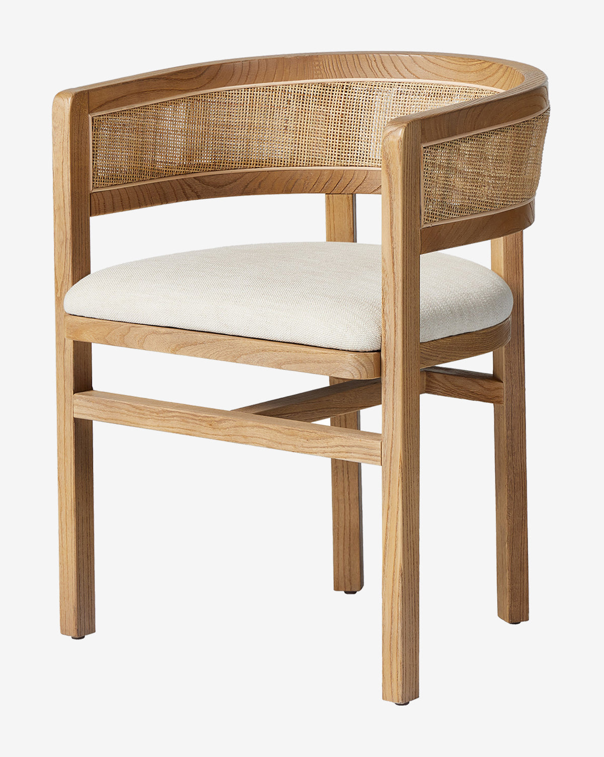 The Valissa Dining Armchair features a modern wooden frame, beige cushioned seat, curved backrest, and woven cane paneling on the back and sides, by McGee & Co.