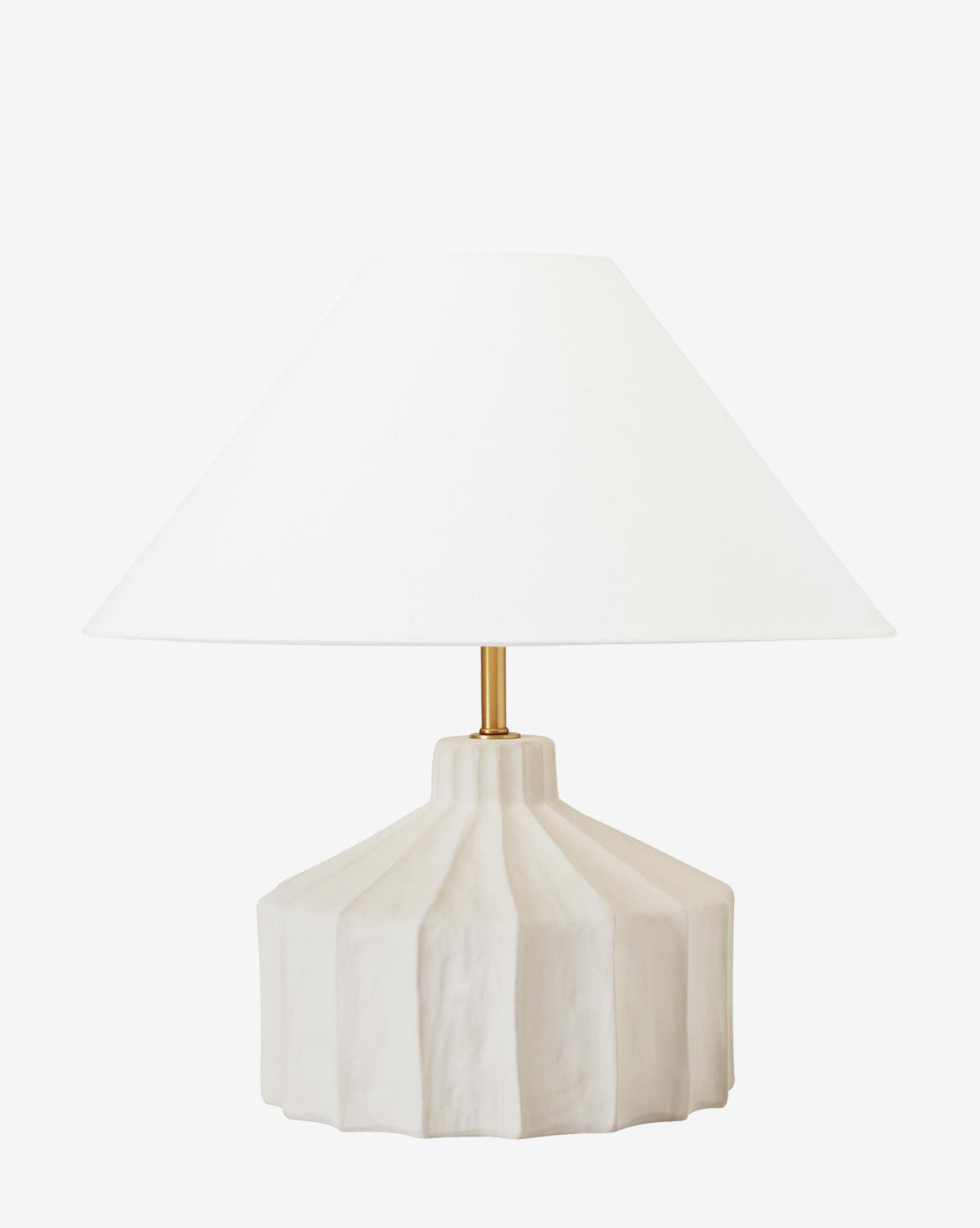 The Veneto Table Lamp showcases a white pleated ceramic base with fluted geometric design, topped by a wide white conical shade. A subtle brass accent joins the base and shade for a blend of modern minimalism and traditional elegance, by McGee & Co.