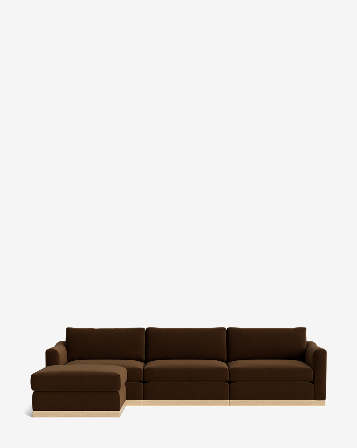 The Vernon Modular Sofa with Ottoman 121 is a modern, dark brown sectional featuring three seats and a left-side chaise lounge, complemented by an ottoman. Set against a white background, this customizable fabric sofa offers both style and comfort for any space by McGee & Co.