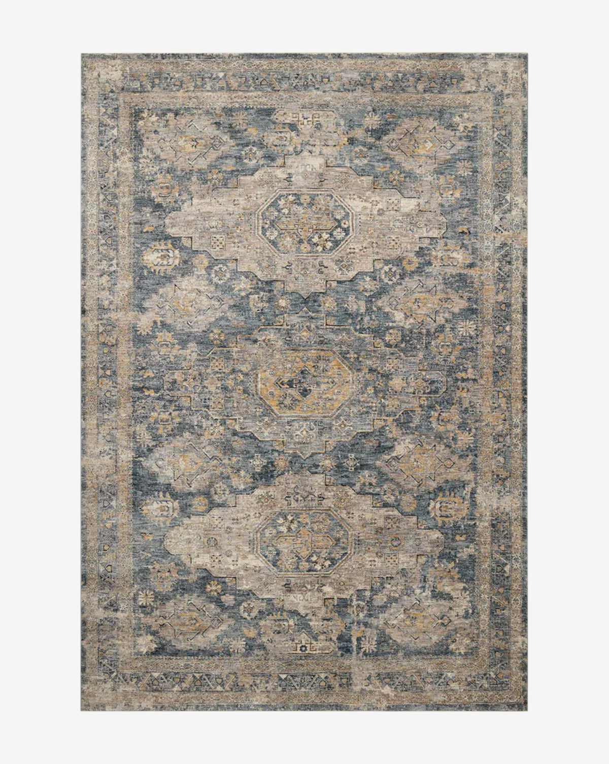 The Vesima Rug is a rectangular, vintage-inspired area rug with blue, beige, and muted gold geometric and floral patterns, detailed decorative border, and a slightly distressed look—ideal for handmade rug enthusiasts by McGee & Co.