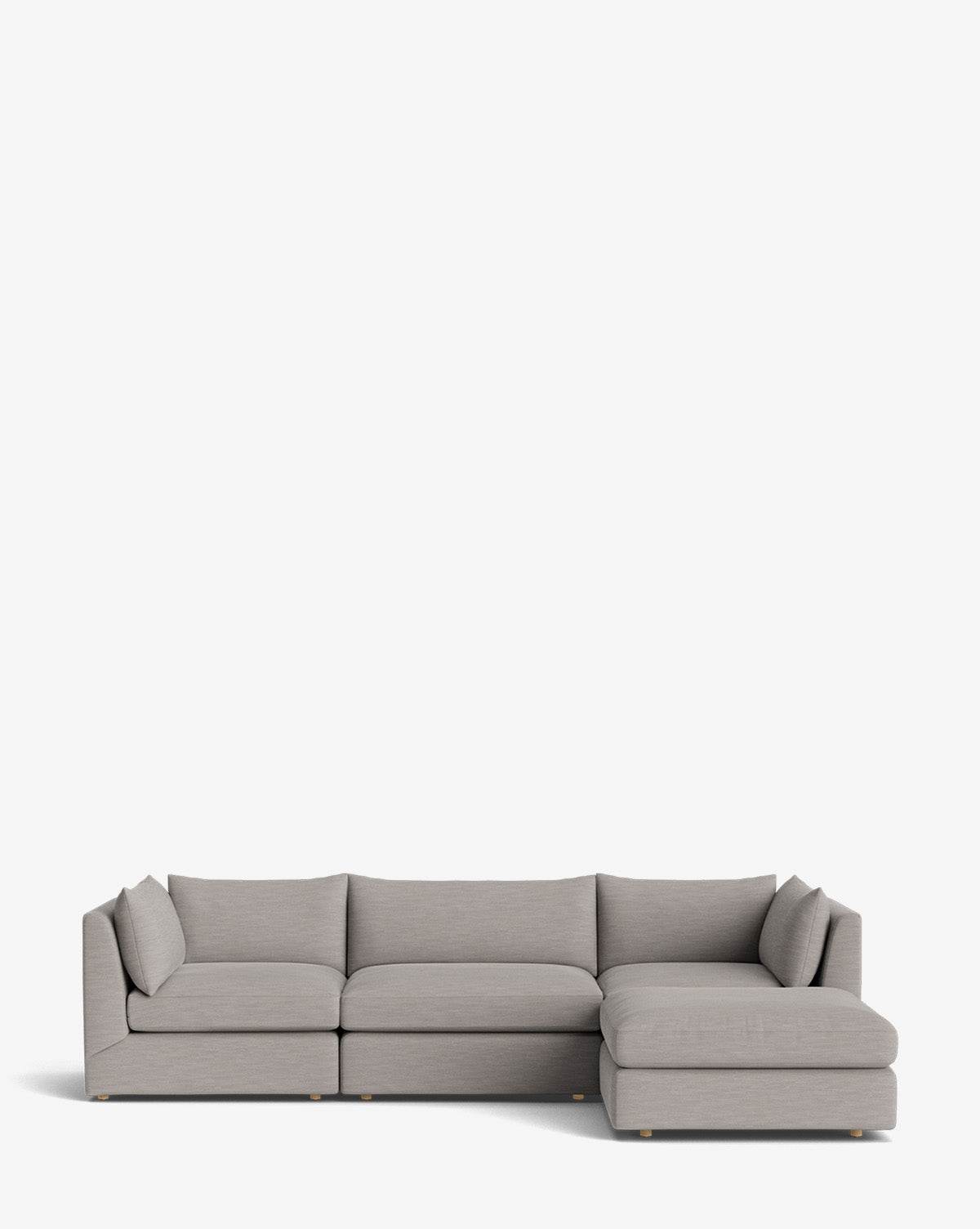 The Vivienne Modular Sofa with Ottoman features a modern light gray design, three seat cushions, and a right-side chaise lounge, presented against a plain white background by McGee & Co.