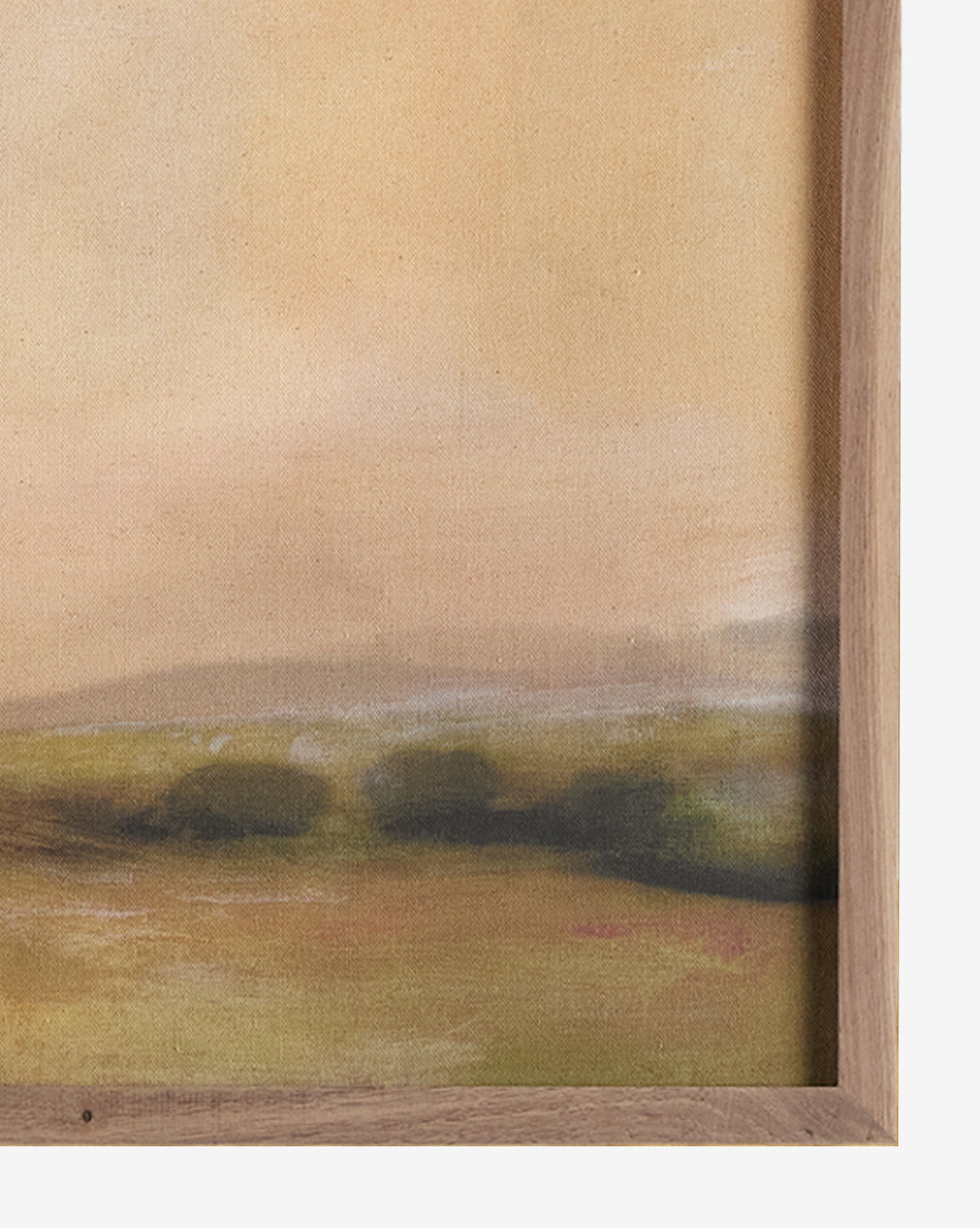 A close-up of Formation by Dan Hobday, a calming landscape canvas print with soft, muted colors, showing a grassy field, distant hills, and a hazy sky, partially cropped on the right side.