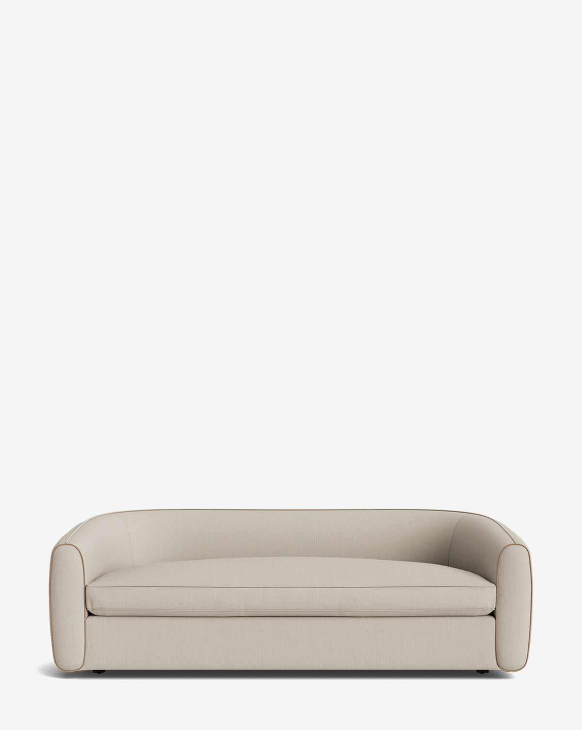 The Wexler Sofa 90 is a modern, light beige sofa with a low backrest and rounded armrests, upholstered in customizable designer fabric, set against a plain white background by McGee & Co.