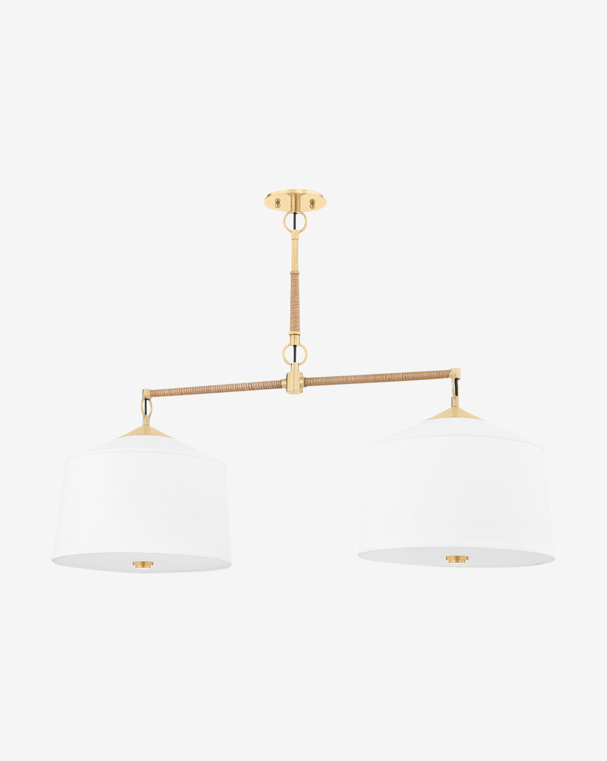 The Hudson Valley Lighting White Plains Island Light is a modern dual pendant featuring gold hardware and two white fabric drum shades, suspended from a rattan-wrapped central rod against a plain white background. McGee & Co.