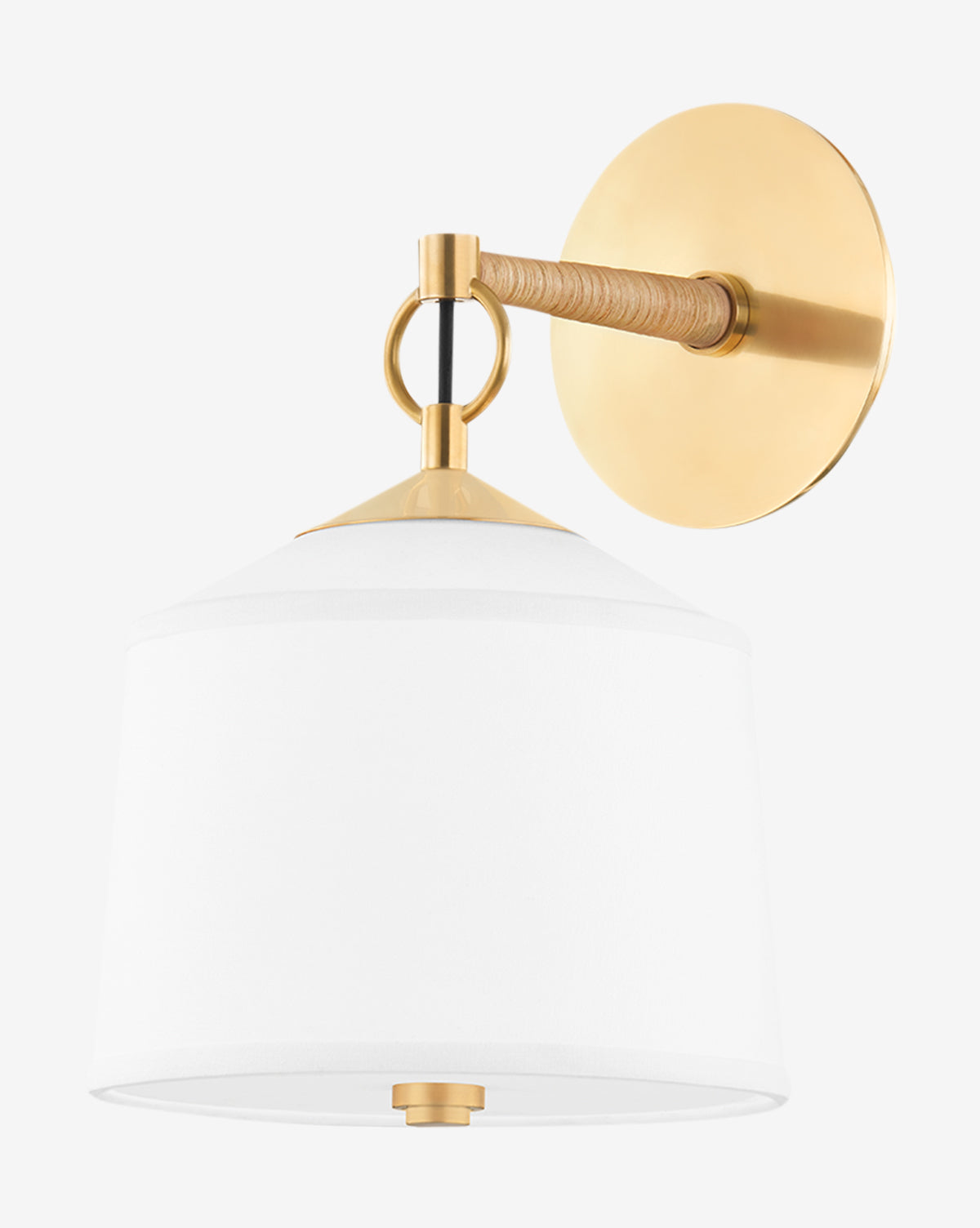 The White Plains Wall Sconce by Hudson Valley Lighting features a round aged-brass backplate, short horizontal arm, white fabric shade, and accents in brass and wood with an elegant rattan-wrapped detail for added texture. McGee & Co.