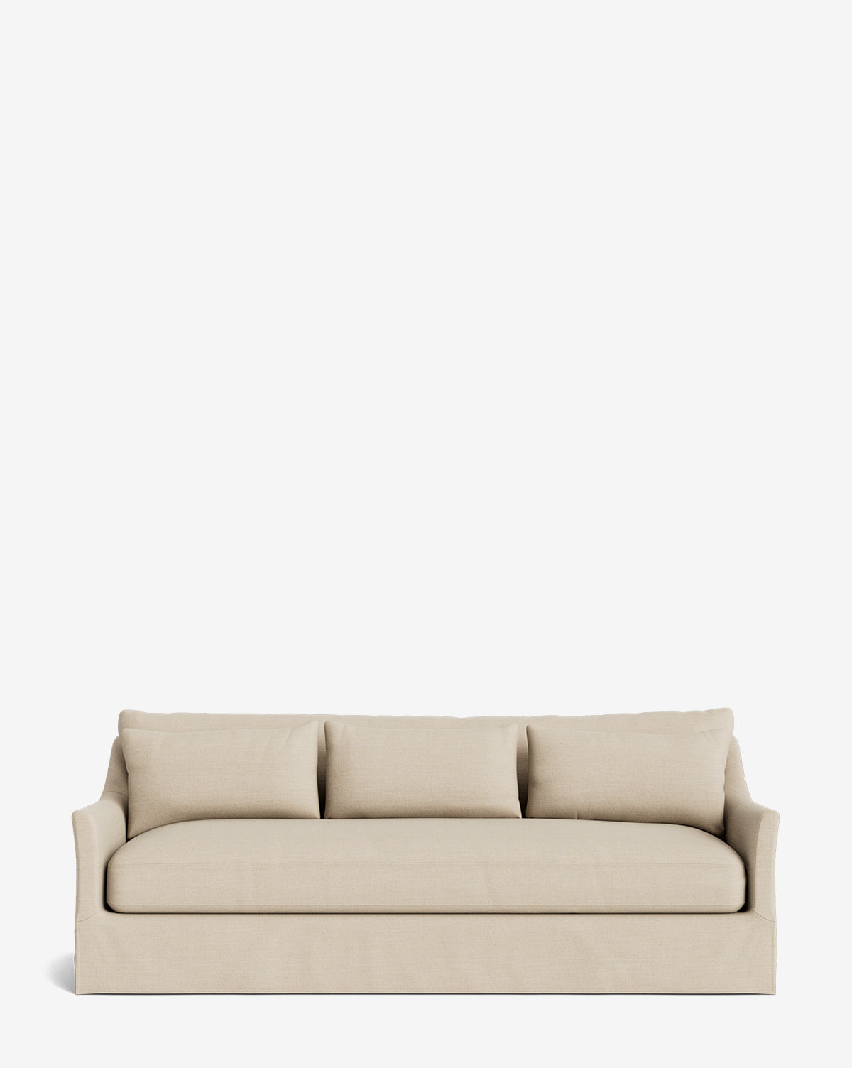 The Wilhelmina Deep Slipcover Sofa (85-110) in beige features three plush back cushions and a skirted base, offering luxurious comfort, by McGee & Co. Pictured against a plain white background.