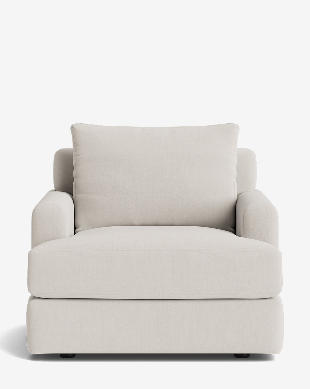 A front view of the Winthrop Lounge Chair, an oversized, customizable lounge chair in light beige fabric with plush seat and back cushions, wide armrests, set against a plain white background by McGee & Co.