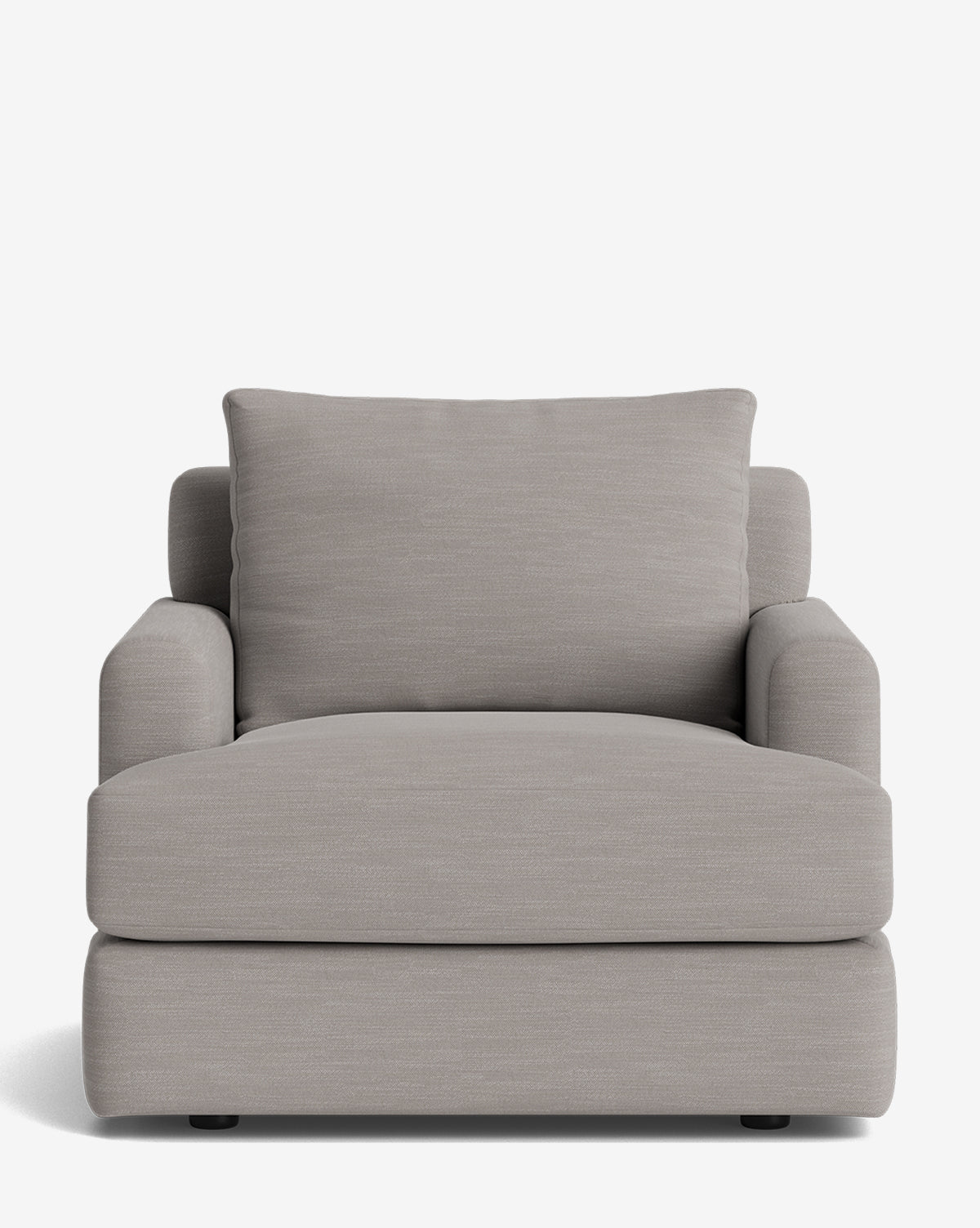 The Winthrop Lounge Chair features plush light gray upholstery, a wide cushioned seat, low armrests, and a thick back cushion, creating a modern look, by McGee & Co. It is pictured on a plain white background.