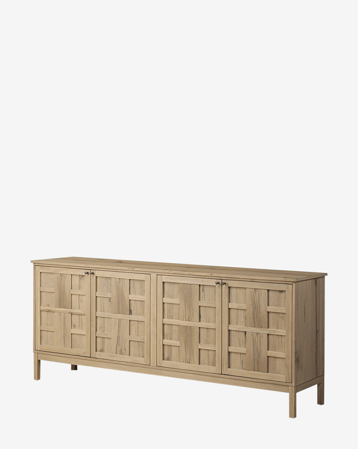 The Wynne Sideboard is a modern, long storage piece with four geometric-patterned doors, crafted from light wood and supported by short legs—perfect for stylish, minimalist spaces by McGee & Co.