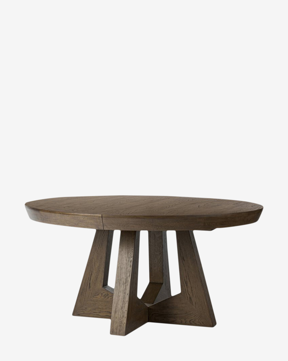 The Yvonne Dining Table showcases a round oak woodgrain design with a smooth dark finish and a geometric pedestal base, pictured against a white background, by McGee & Co.