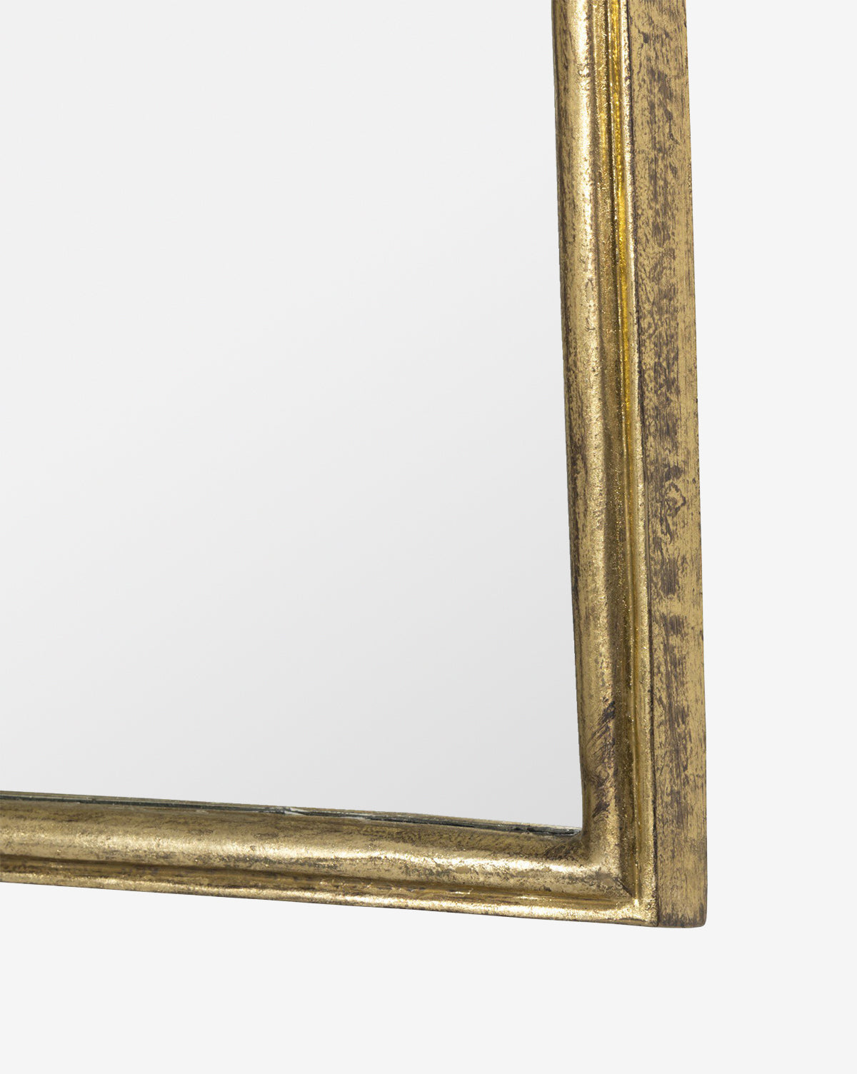 Close-up of the bottom right corner of the Zosia Wall Mirror, featuring an antique gold, textured ornate frame against a plain white background—ideal for bringing elegant style to any room, by McGee & Co.