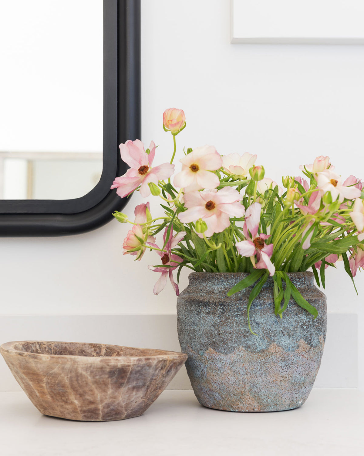 Earthy Textured Pot in profile, showing natural color variation and handcrafted detail, with flowers from McGee & Co.
