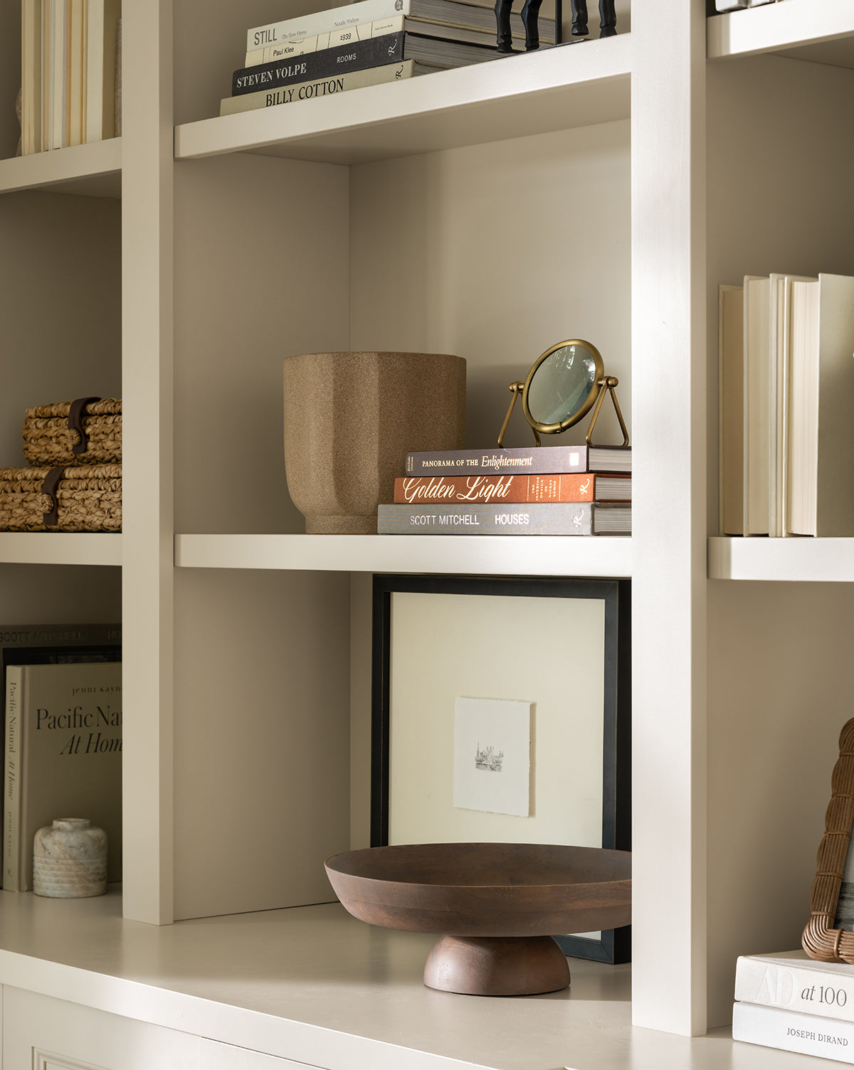 Trella Planter istyled together with other  indoor decor on a shelf, from McGee & Co.
